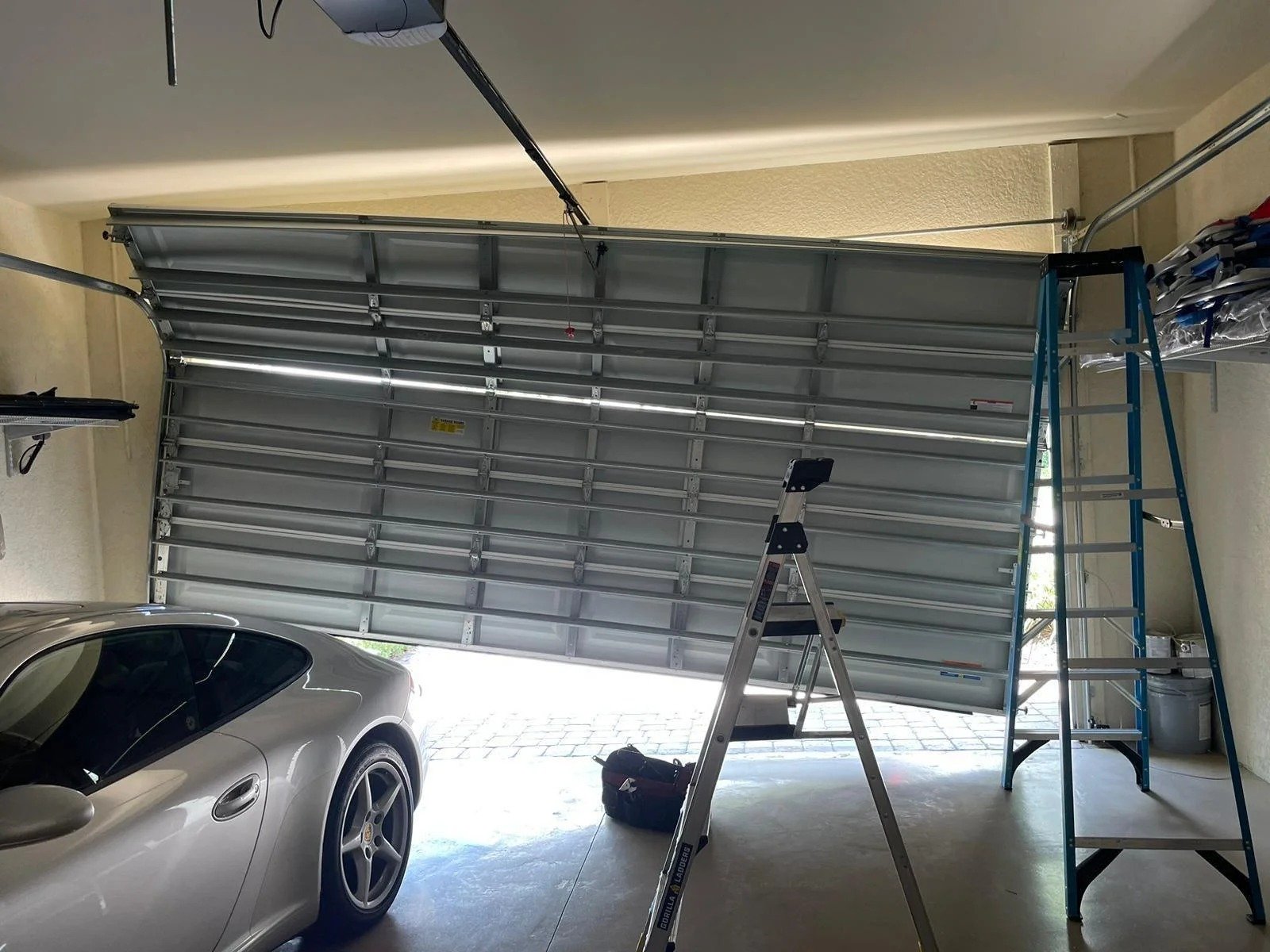 Off-track garage door repair Mason